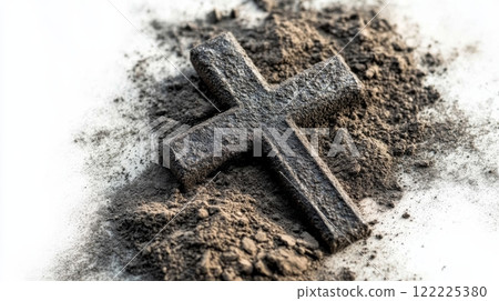 Cross is on top of a pile of dirt 122225380