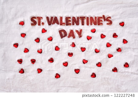 Festive St. Valentine's Day background on a white plush background with hearts. 122227248