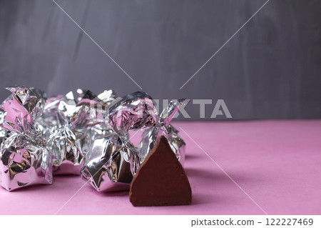 Candy in a cut in a silver wrapper. Handmade Candy Concept 122227469
