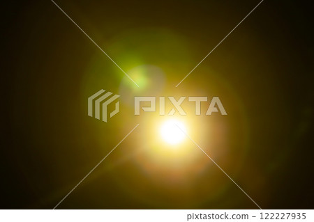 Sun flare on the black background Sun flare on the black background 122227935