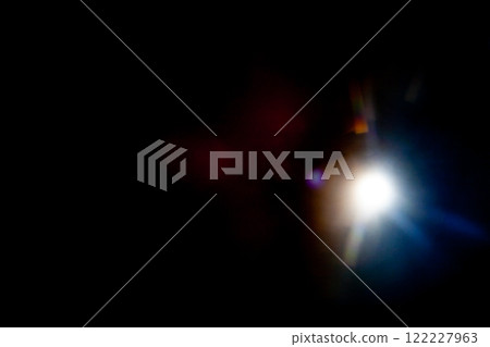 Sun flare on the black background Sun flare on the black background 122227963