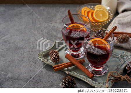 Winter mulled wine cocktail with orange and cinnamon 122228271