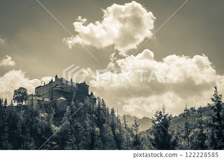 Castle Hohenwerfen chateau fortress on mountain in Werfen Salzburg Austria. Castle Hohenwerfen chateau fortress on mountain in Werfen Salzburg Austria. 122228585