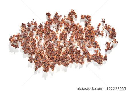 Roasted brown buckwheat groats forming an intricate pattern on white background Roasted brown buckwheat groats forming an intricate pattern on white background 122228635