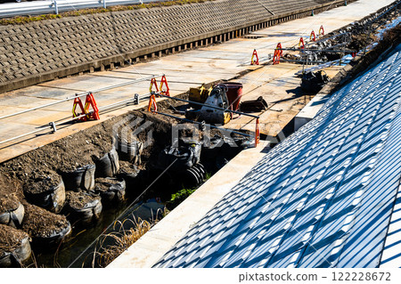 Renovation work on a bank with piled sandbags Shin-Kashi River 2025.01 e-2 High saturation contrast 122228672