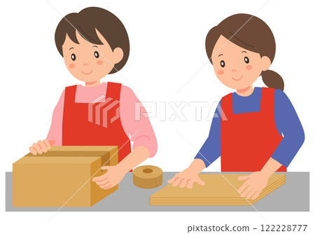 A woman in an apron packing cardboard boxes 122228777