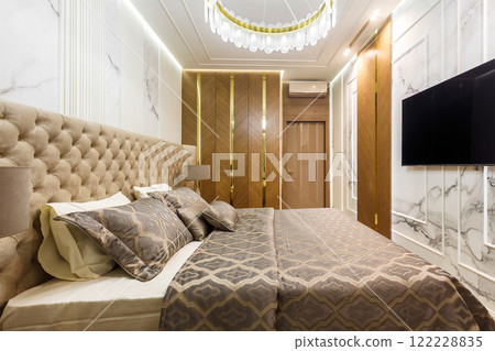 Luxury Interior Primary Bedroom Detail of Headboard and Bedding. Luxury Interior Primary Bedroom Detail of Headboard and Bedding. 122228835