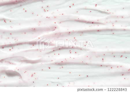 Smooth creamy texture with red speckles on white background Smooth creamy texture with red speckles on white background 122228843