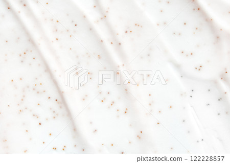 Smooth white cream texture with brown exfoliating microbeads for skincare Smooth white cream texture with brown exfoliating microbeads for skincare 122228857