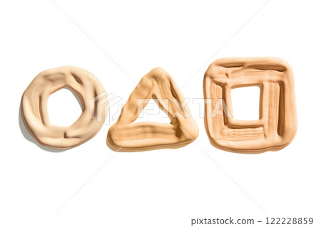 Assorted geometric shapes made from beige clay or putty on white background Assorted geometric shapes made from beige clay or putty on white background 122228859