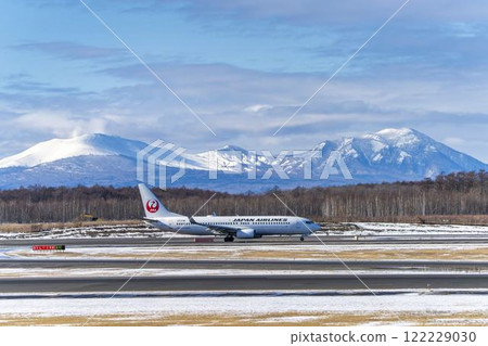 Planes at New Chitose Airport in winter, Mount Tarumae and Mount Fusubushi, Chitose, Hokkaido 122229030