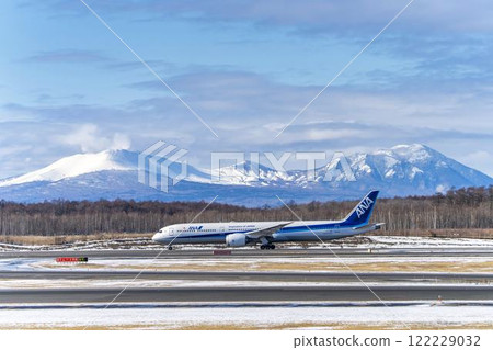 Planes at New Chitose Airport in winter, Mount Tarumae and Mount Fusubushi, Chitose, Hokkaido Planes at New Chitose Airport in winter, Mount Tarumae and Mount Fusubushi, Chitose, Hokkaido 122229032