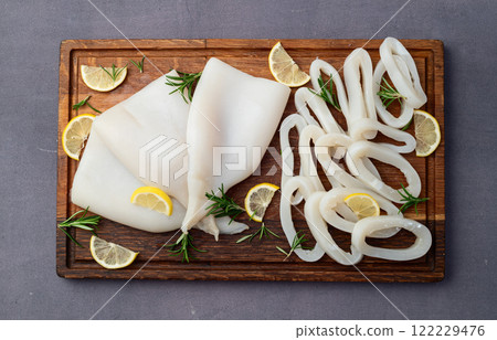 Squid tube and ring photography . Seafood top view 122229476