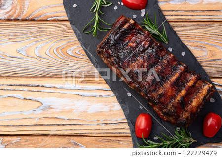 Grilled Pork ribs barbecue photography . Top view 122229479