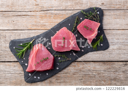 Raw tuna steak ( fillet ) photography . Top view Raw tuna steak ( fillet ) photography . Top view 122229816