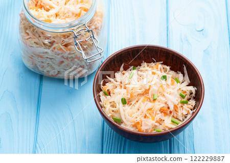 Tasty marinated cabbage with carrot, healthy food  Sauerkraut photography . Top view 122229887