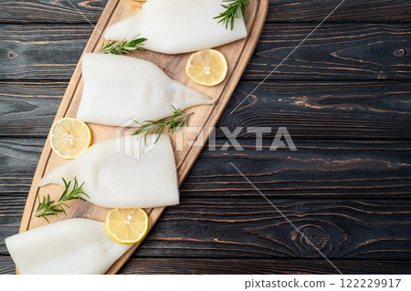 Squid tube and ring photography . Seafood top view 122229917