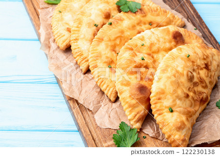 Snack chebureks. Pasties with meat photography . Top view 122230138