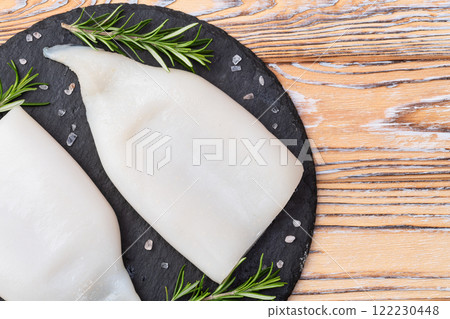 Squid tube and ring photography . Seafood top view 122230448