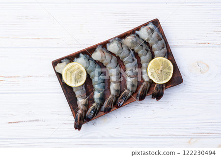 Raw big tiger ( king ) shrimps Cleaned, Peeled & Deveined photography . Top view 122230494