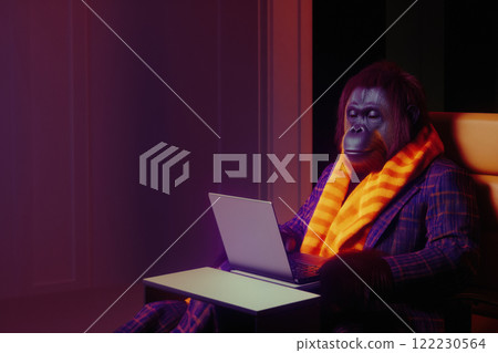 Orangutan in bright stylish clothes and orange scarf, immersed in work on laptop in modern coworking, digital nomad concept 122230564