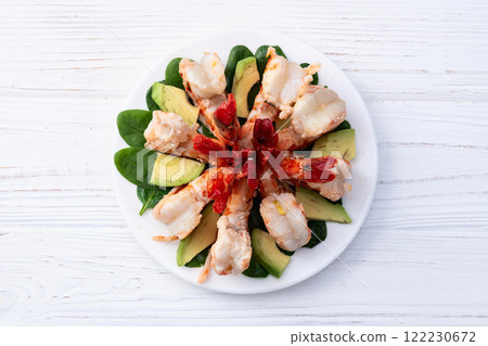 Salad with tiger shrimps , avocado and mango . Top view Salad with tiger shrimps , avocado and mango . Top view 122230672