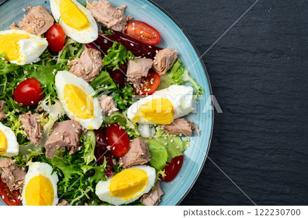 Canned Tuna salad with eggs and tomatoes photography . Top view Canned Tuna salad with eggs and tomatoes photography . Top view 122230700