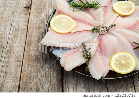 Raw tilapia fillet photography . Top view 122230712