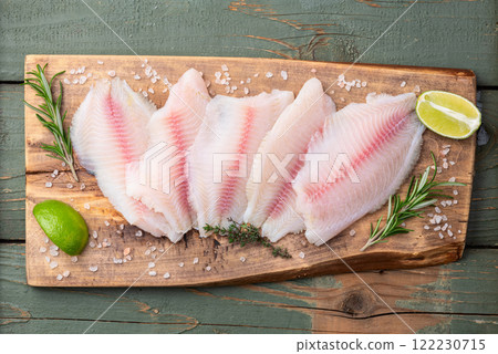 Raw tilapia fillet photography . Top view 122230715