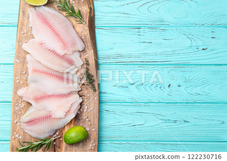 Raw tilapia fillet photography . Top view 122230716