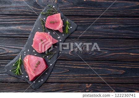 Raw tuna steak ( fillet ) photography . Top view 122230741