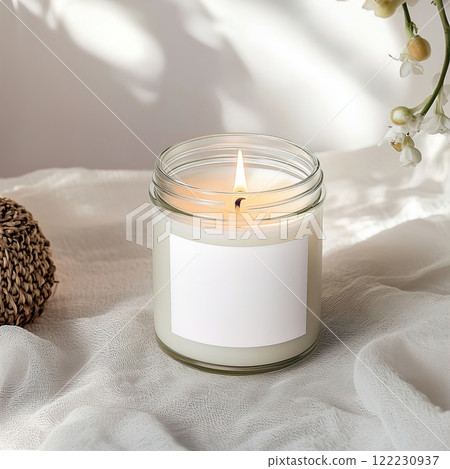 Clear glass jar candle mockup, scented candle jar with blank white label, styled interior candle design template 122230937