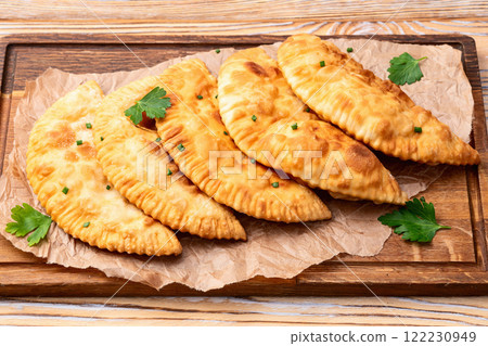 Snack chebureks. Pasties with meat photography . Top view 122230949