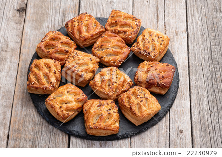 Homemade mini puff pastries with meat photography . Top view 122230979