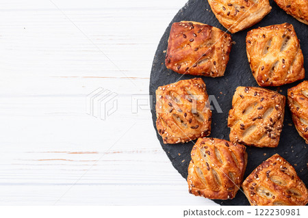 Homemade mini puff pastries with meat photography . Top view Homemade mini puff pastries with meat photography . Top view 122230981