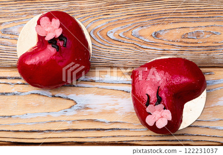Valentine day and wedding sweet dessert . Two heart love cake 122231037