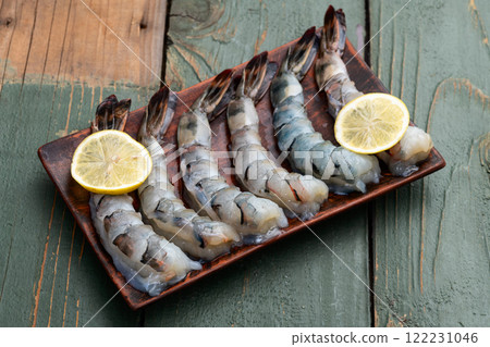 Raw big tiger ( king ) shrimps Cleaned, Peeled & Deveined photography . Top view 122231046
