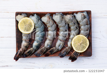 Raw big tiger ( king ) shrimps Cleaned, Peeled & Deveined photography . Top view 122231047