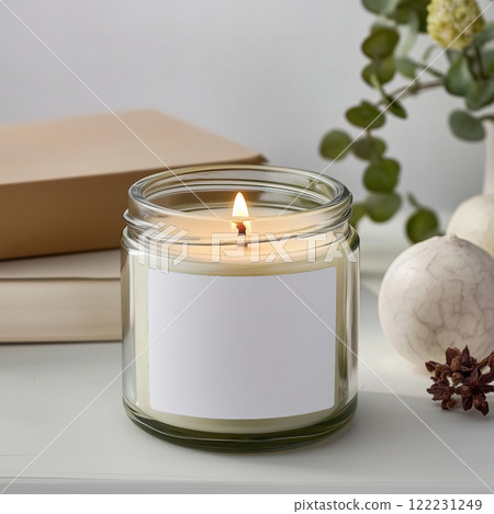 Clear glass jar candle mockup, scented candle jar with blank white label, styled interior candle design template Clear glass jar candle mockup, scented candle jar with blank white label, styled interior candle design template 122231249