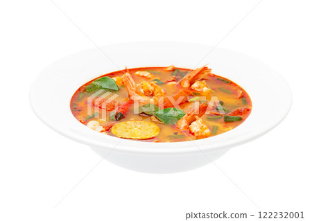 Closeup plate of traditional thai soup - tom yum kung isolated at white background. Closeup plate of traditional thai soup - tom yum kung isolated at white background. 122232001