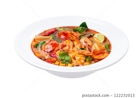 Closeup plate of traditional thai soup - tom yum kung with shrimps and tomatoes isolated at white background. Closeup plate of traditional thai soup - tom yum kung with shrimps and tomatoes isolated at white background. 122232013
