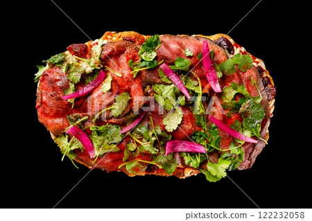 Top view image of italian Rome pizza with caramel plum and beef meat isolated at black background. Top view image of italian Rome pizza with caramel plum and beef meat isolated at black background. 122232058