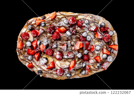 Top view image of Rome pizza with berries and sugar powder isolated at black background. Top view image of Rome pizza with berries and sugar powder isolated at black background. 122232067