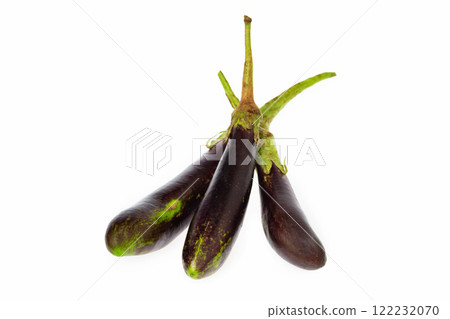 Closeup image of purple small thailand egglants group isolated at white background. Healthy vegan vegetable diet concept. Closeup image of purple small thailand egglants group isolated at white background. Healthy vegan vegetable diet concept. 122232070