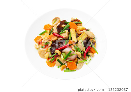 Closeup plate of traditional thai food - stir fried chicken with cashew nuts isolated at white background. Closeup plate of traditional thai food - stir fried chicken with cashew nuts isolated at white background. 122232087