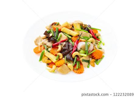 Closeup plate of traditional thai food - stir fried chicken with cashew nuts isolated at white background. Closeup plate of traditional thai food - stir fried chicken with cashew nuts isolated at white background. 122232089