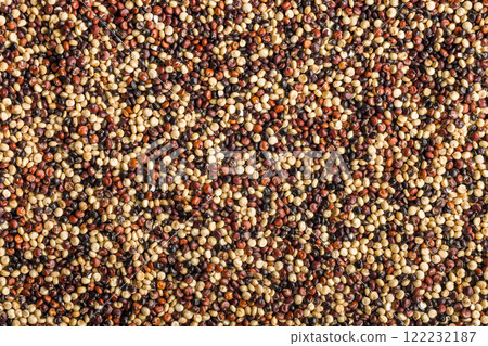 Mixed uncooked quinoa seeds. Top view. Mixed uncooked quinoa seeds. Top view. 122232187