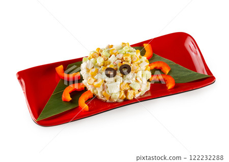Closeup plate of crab salad with corn and eggs served as a funny crab for children menu isolated at white background. Closeup plate of crab salad with corn and eggs served as a funny crab for children menu isolated at white background. 122232288