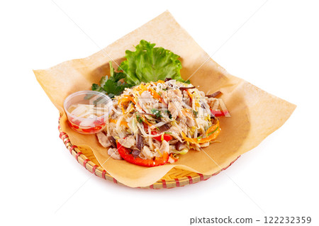 Wicker plate of traditional vietnamese dish - rice noodles with chicken meat and vegetables isolated at white background. 122232359