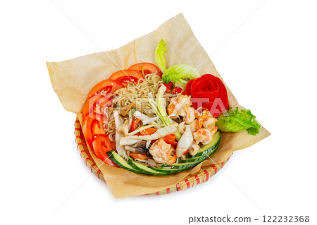 Wicker plate of traditional vietnamese dish - egg noodles with seafood, shrimps and vegetables isolated at white background. 122232368
